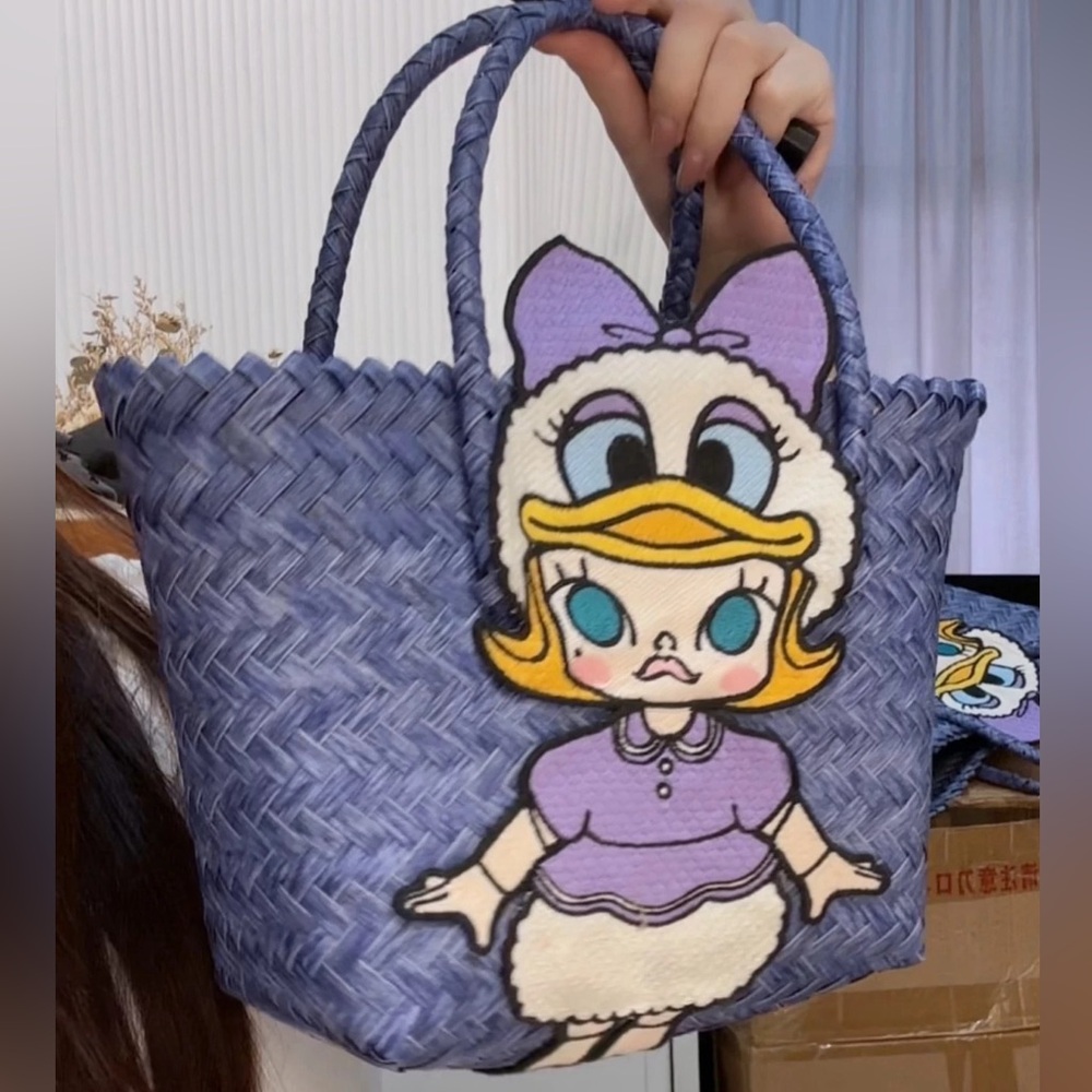 New hand-woven straw Daisy Molly tote